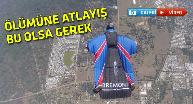 Helikopterden paraşütsüz atladı
