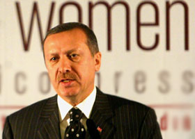 Erdoğan: Türban er geç çözülecek