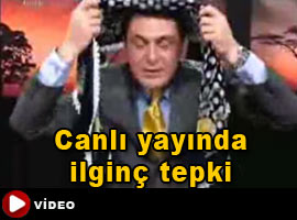 Canlı yayında başını örttü! - Video